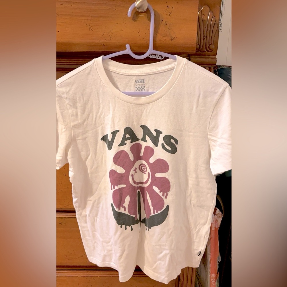 White vans tee with purple paint run down daisy .